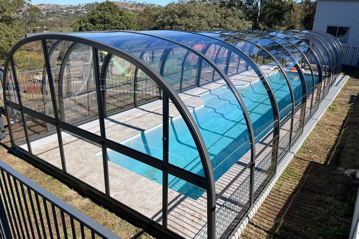 telescopic-retractable-pool cover-enclosure-dallas clear-custom-kbl pool enclosures11