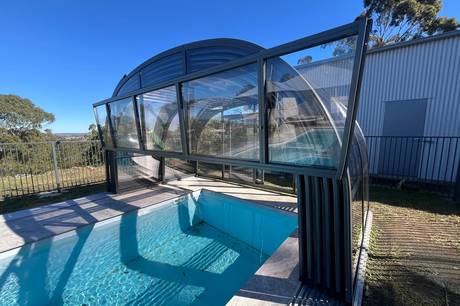 telescopic-retractable-pool cover-enclosure-dallas clear-custom-kbl pool enclosures3
